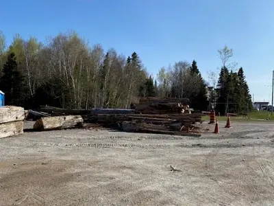 Wooden parking barriers stacked up