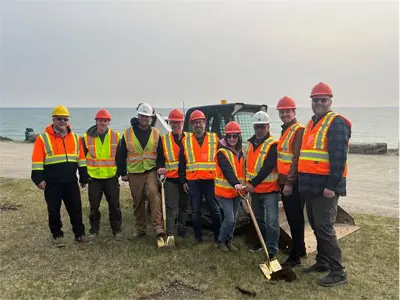 Council and RML Staff holding gold shovels for groundbreaking ceremony